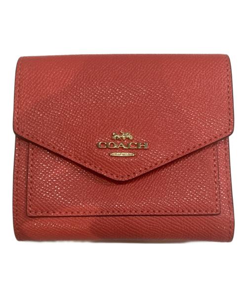 COACH（コーチ）COACH (コーチ) 2つ折り財布 オレンジの古着・服飾アイテム