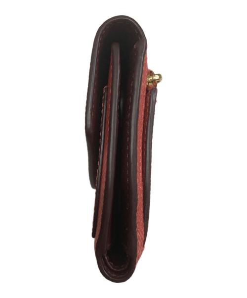 COACH（コーチ）COACH (コーチ) 2つ折り財布 オレンジの古着・服飾アイテム