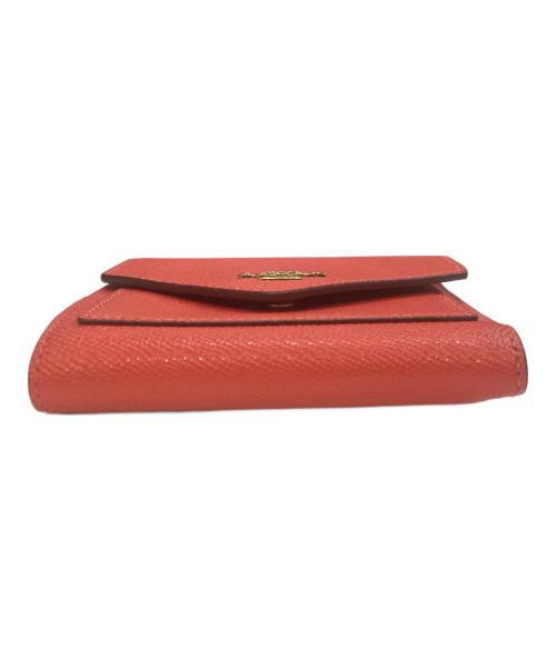 COACH（コーチ）COACH (コーチ) 2つ折り財布 オレンジの古着・服飾アイテム