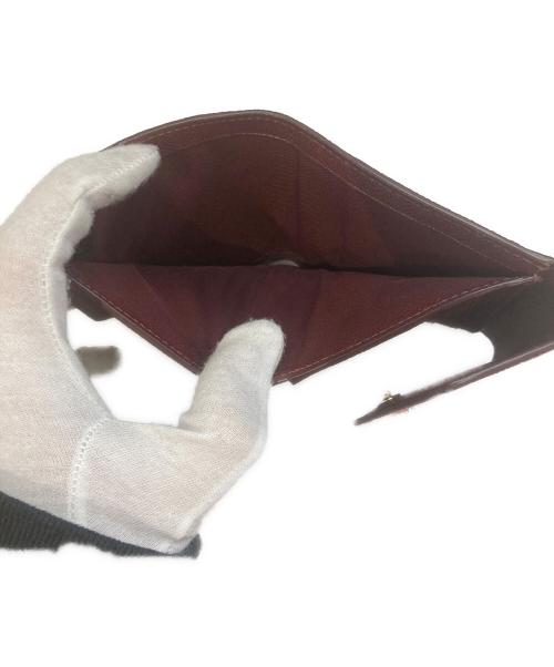 COACH（コーチ）COACH (コーチ) 2つ折り財布 オレンジの古着・服飾アイテム