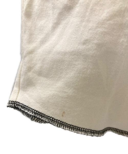 stussy（ステューシー）stussy (ステューシー) 00S クロスボーンプリントラグランカットソー ブラック×ホワイト サイズ:Mの古着・服飾アイテム