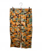 Stockholm Surfboard Clubストックホルム サーフボード クラブ）の古着「Printed Cargo Trousers」｜オレンジ