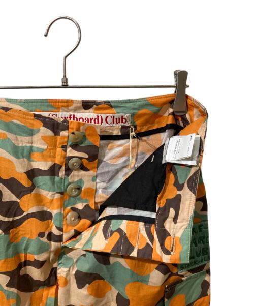 Stockholm Surfboard Club（ストックホルム サーフボード クラブ）STOCKHOLM SURFBOARD CLUB (ストックホルム サーフボード クラブ) Printed Cargo Trousers オレンジ サイズ:S 未使用品の古着・服飾アイテム