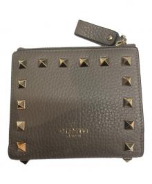 VALENTINO（ヴァレンティノ）の古着「ロックスタッズ2つ折り財布」｜グレー