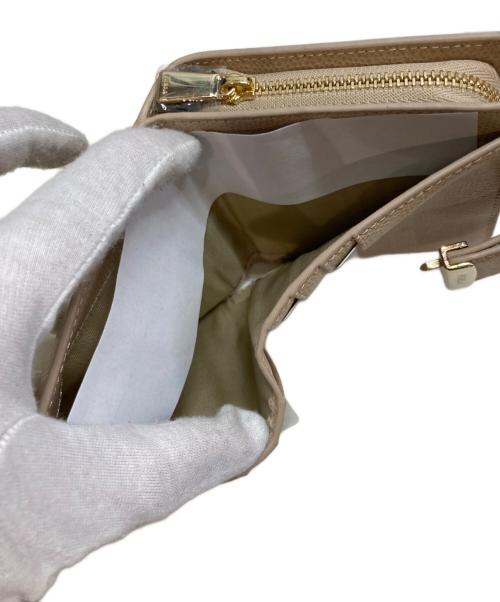 FURLA（フルラ）FURLA (フルラ) メトロポリス/2つ折り財布 ベージュ 未使用品の古着・服飾アイテム
