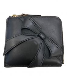 COMME des GARCONS（コムデギャルソン）の古着「BIG BOW L字型コインケース」｜ブラック