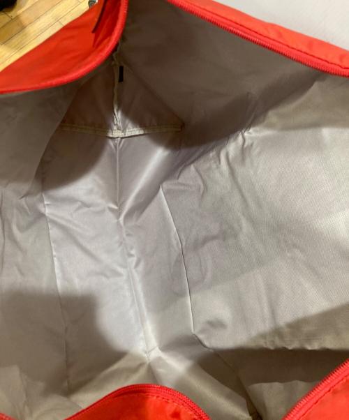 TUMI（トゥミ）TUMI (トゥミ) just in case/ナイロントート オレンジの古着・服飾アイテム