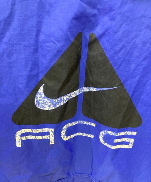 NIKE ACG（ナイキエーシージー）NIKE ACG (ナイキエーシージー) PLAYGROUND (プレイグラウンド) 古着ロゴプリントナイロンジャケット ブルー サイズ:Mの古着・服飾アイテム