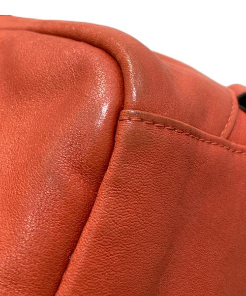 TUMI（トゥミ）TUMI (トゥミ) レザースリングバック オレンジの古着・服飾アイテム