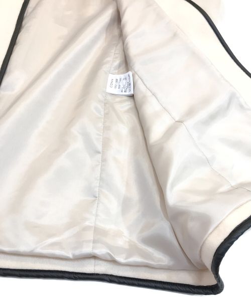 CONN（コン）CONN (コン) パイピングトッパーポンチョ アイボリー サイズ:FREEの古着・服飾アイテム