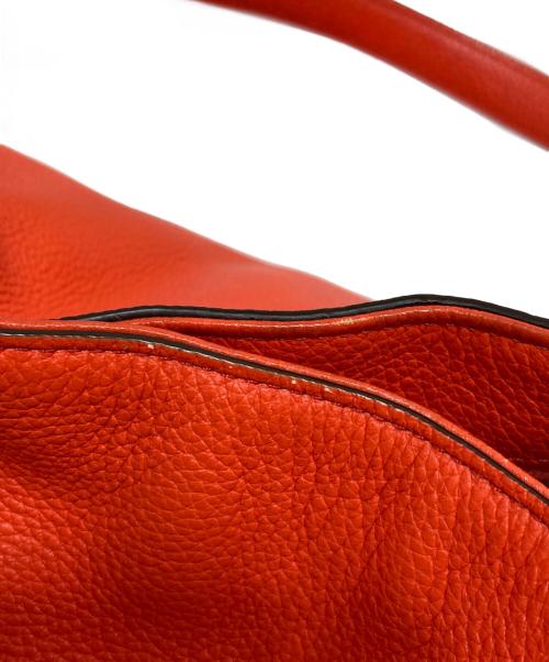 COACH（コーチ）COACH (コーチ) ハンドバッグ オレンジの古着・服飾アイテム