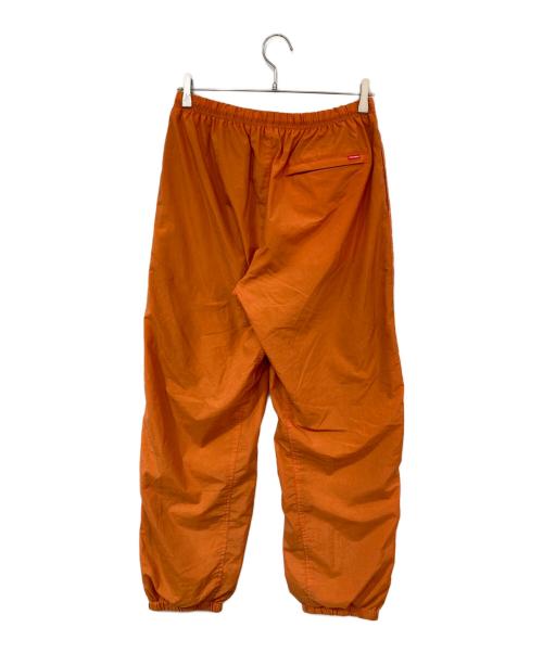 TIGHTBOOTH PRODUCTION（タイトブースプロダクション）TIGHTBOOTH PRODUCTION (タイトブースプロダクション) ナイロンパンツ オレンジ サイズ:SIZE Lの古着・服飾アイテム