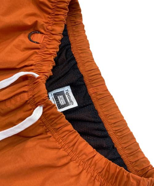 TIGHTBOOTH PRODUCTION（タイトブースプロダクション）TIGHTBOOTH PRODUCTION (タイトブースプロダクション) ナイロンパンツ オレンジ サイズ:SIZE Lの古着・服飾アイテム