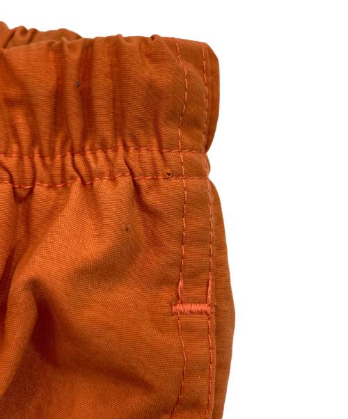 TIGHTBOOTH PRODUCTION（タイトブースプロダクション）TIGHTBOOTH PRODUCTION (タイトブースプロダクション) ナイロンパンツ オレンジ サイズ:SIZE Lの古着・服飾アイテム