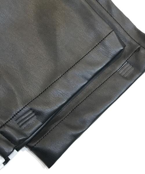 adidas（アディダス）adidas (アディダス) フェイクレザー アディカラー スリーストライプス ファイヤーバード トラックスーツパンツ ブラック サイズ:Lの古着・服飾アイテム