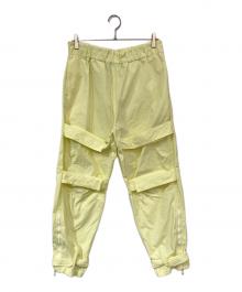 LOUIS VUITTON（ルイ ヴィトン）の古着「モノグラムフクアンドループジップパンツ」｜イエロー