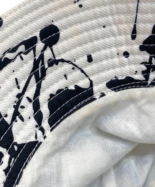 HERMES（エルメス）HERMES (エルメス) ペンキ柄バケットハット ホワイト×ブラックの古着・服飾アイテム