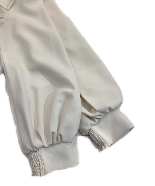 UNITED TOKYO（ユナイテッドトーキョー）UNITED TOKYO (ユナイテッドトーキョー) ラップフロントアシメブラウス ホワイト サイズ:FREEの古着・服飾アイテム