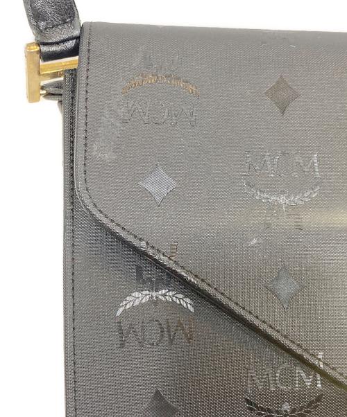 MCM（エムシーエム）MCM (エムシーエム) 総柄ショルダーバッグ ブラックの古着・服飾アイテム