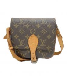 LOUIS VUITTON（ルイ ヴィトン）の古着「カルトシエールPM　モノグラム」｜ブラウン