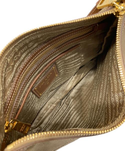 PRADA（プラダ）PRADA (プラダ) ロゴジャガードショルダーバッグ ベージュの古着・服飾アイテム