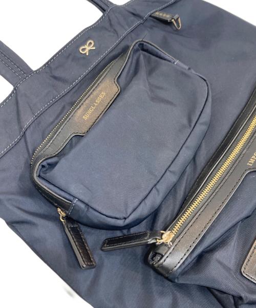 ANYA HINDMARCH（アニヤ・ハインドマーチ）ANYA HINDMARCH (アニヤ・ハインドマーチ) マルチポケットナイロントートバッグ ネイビーの古着・服飾アイテム