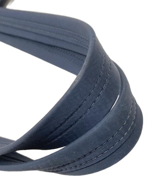 ANYA HINDMARCH（アニヤ・ハインドマーチ）ANYA HINDMARCH (アニヤ・ハインドマーチ) マルチポケットナイロントートバッグ ネイビーの古着・服飾アイテム