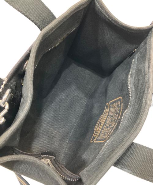 COACH（コーチ）COACH (コーチ) PEANUTS (ピーナッツ) カーゴ トート バッグ 26・スヌーピー プリント ブラックの古着・服飾アイテム