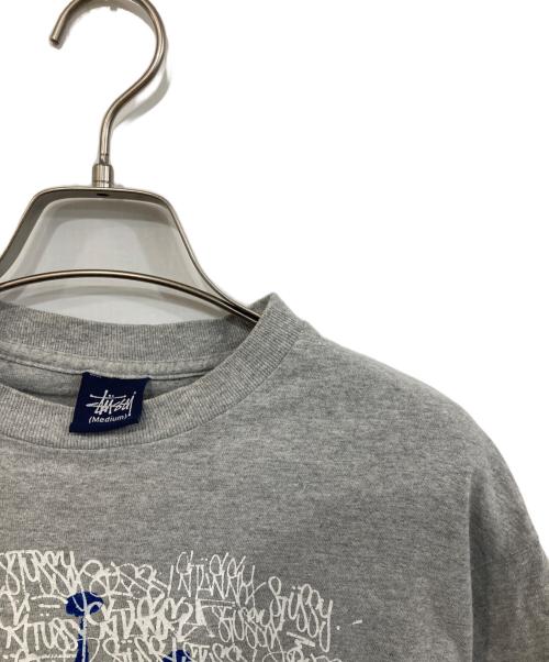 stussy（ステューシー）stussy (ステューシー) プリントTシャツ グレー サイズ:SIZE Mの古着・服飾アイテム