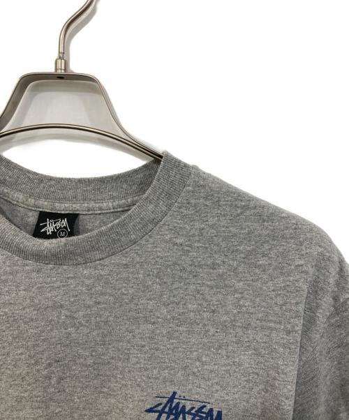 stussy（ステューシー）stussy (ステューシー) SURF MAN TEE グレー サイズ:SIZE Mの古着・服飾アイテム