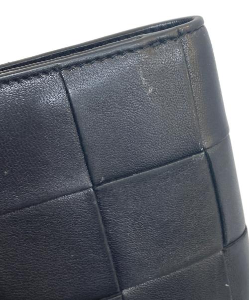BOTTEGA VENETA（ボッテガベネタ）BOTTEGA VENETA (ボッテガベネタ) 2つ折り財布 ブラックの古着・服飾アイテム