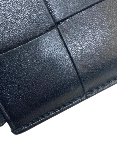 BOTTEGA VENETA（ボッテガベネタ）BOTTEGA VENETA (ボッテガベネタ) 2つ折り財布 ブラックの古着・服飾アイテム