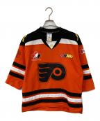 NHLエヌエイチエル）の古着「Philadelphia Flyers/フィラデルフィア フライヤーズ　ゲームシャツ」｜オレンジ