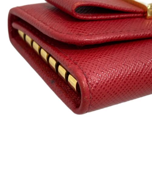 PRADA（プラダ）PRADA (プラダ) サフィアーノレザー リボン６連キーケース レッドの古着・服飾アイテム