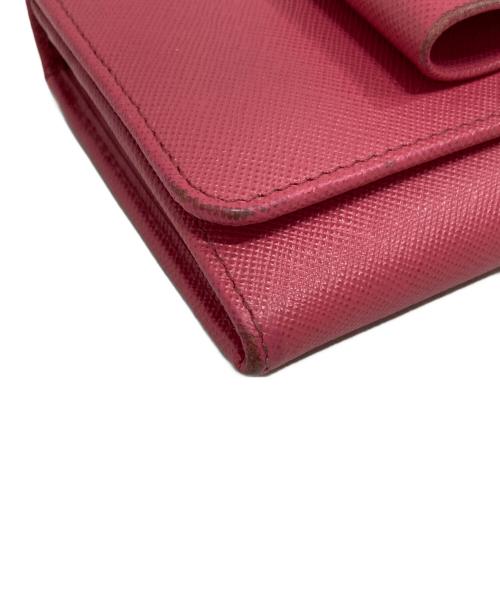 PRADA（プラダ）PRADA (プラダ) カードケース付きサフィアーノレザー長財布 ピンクの古着・服飾アイテム