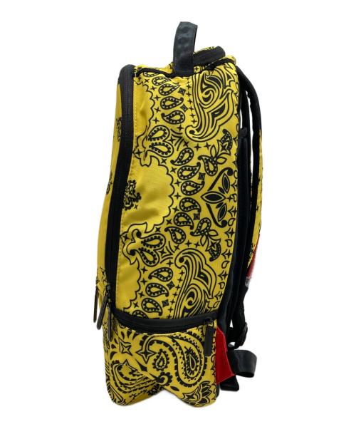 SPRAYGROUND（スプレーグランド）SPRAYGROUND (スプレーグランド) リュック イエロー 未使用品の古着・服飾アイテム