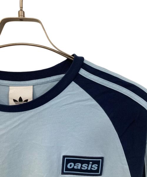 adidas（アディダス）adidas (アディダス) oasis (オアシス) ツアー スリーストライプス 長袖Tシャツ ブルー サイズ:2XLの古着・服飾アイテム
