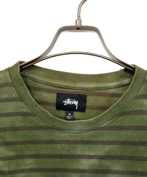 stussy（ステューシー）stussy (ステューシー) Bleach Stripe ロンT グリーン サイズ:SIZE Mの古着・服飾アイテム
