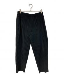 HOMME PLISSE ISSEY MIYAKE（オム プリッセ イッセイ ミヤケ）の古着「プリーツテーパードパンツ」｜ブラック