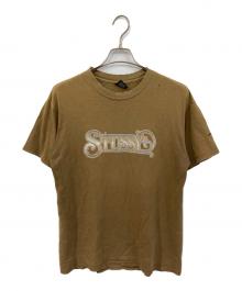 stussy（ステューシー）の古着「CARNEY T/カーニー ティー」｜ブラウン