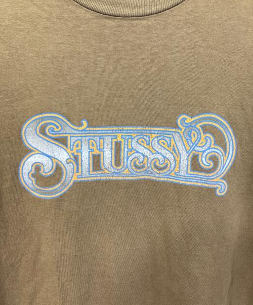 stussy（ステューシー）stussy (ステューシー) CARNEY T/カーニー ティー ブラウン サイズ:SIZE Mの古着・服飾アイテム
