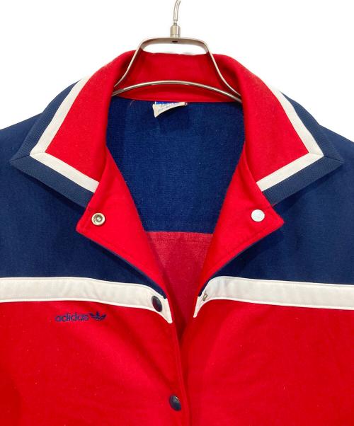 adidas（アディダス）adidas (アディダス) 70’s 西ドイツ スナップパッチ トラックジャケット レッド×ネイビー サイズ:SIZE Mの古着・服飾アイテム