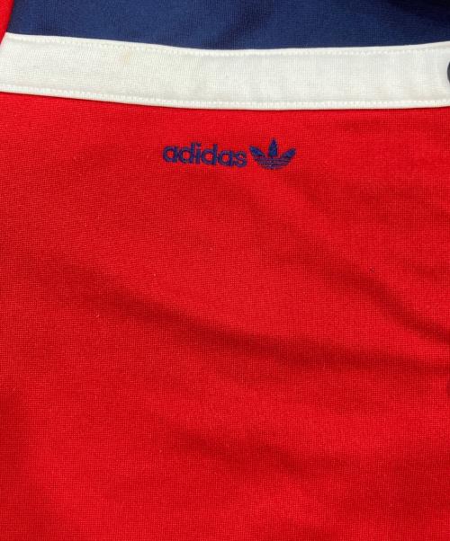 adidas（アディダス）adidas (アディダス) 70’s 西ドイツ スナップパッチ トラックジャケット レッド×ネイビー サイズ:SIZE Mの古着・服飾アイテム