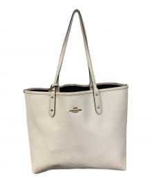 COACH（コーチ）の古着「リバーシブルトートバッグ」｜アイボリー×ブラック
