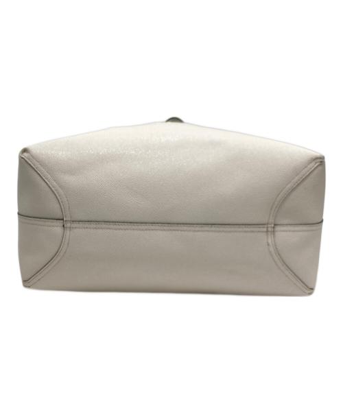 COACH（コーチ）COACH (コーチ) リバーシブルトートバッグ アイボリー×ブラックの古着・服飾アイテム