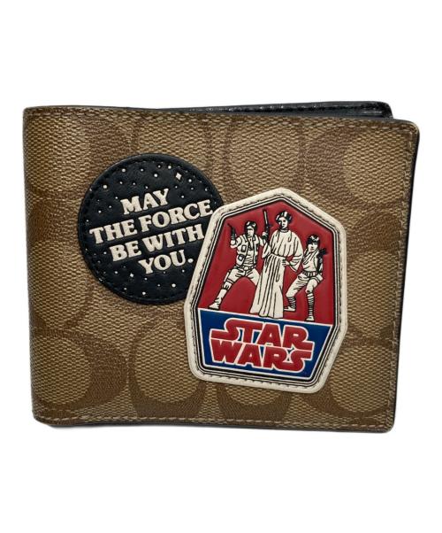 COACH（コーチ）COACH (コーチ) スターウォーズ・シグネチャー2つ折り財布 ベージュの古着・服飾アイテム