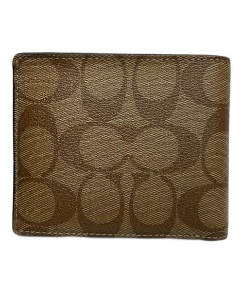 COACH（コーチ）COACH (コーチ) スターウォーズ・シグネチャー2つ折り財布 ベージュの古着・服飾アイテム