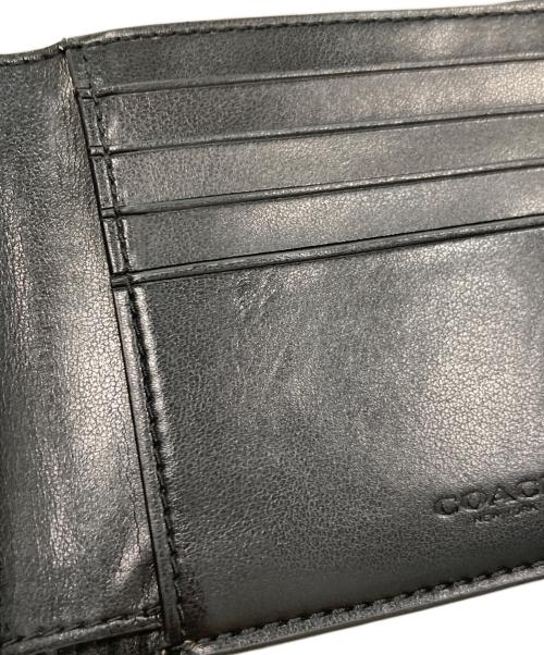 COACH（コーチ）COACH (コーチ) スターウォーズ・シグネチャー2つ折り財布 ベージュの古着・服飾アイテム