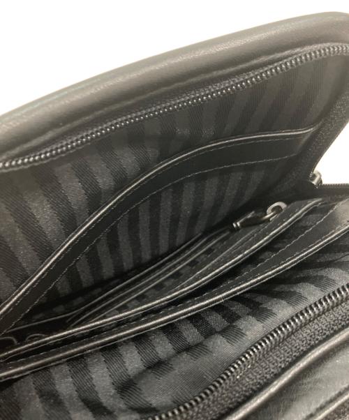 TUMI（トゥミ）TUMI (トゥミ) レザーショルダーバッグ ブラックの古着・服飾アイテム