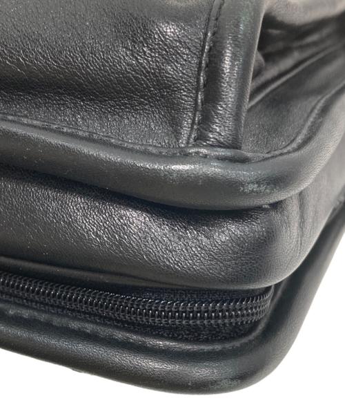 TUMI（トゥミ）TUMI (トゥミ) レザーショルダーバッグ ブラックの古着・服飾アイテム